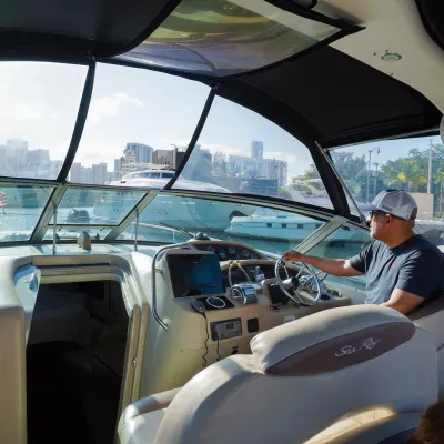 a boat sitting on top of a car